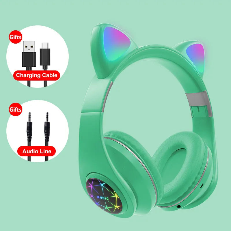 Colourful cat ear style wireless Bluetooth sports headset with a headband, shown in pink.