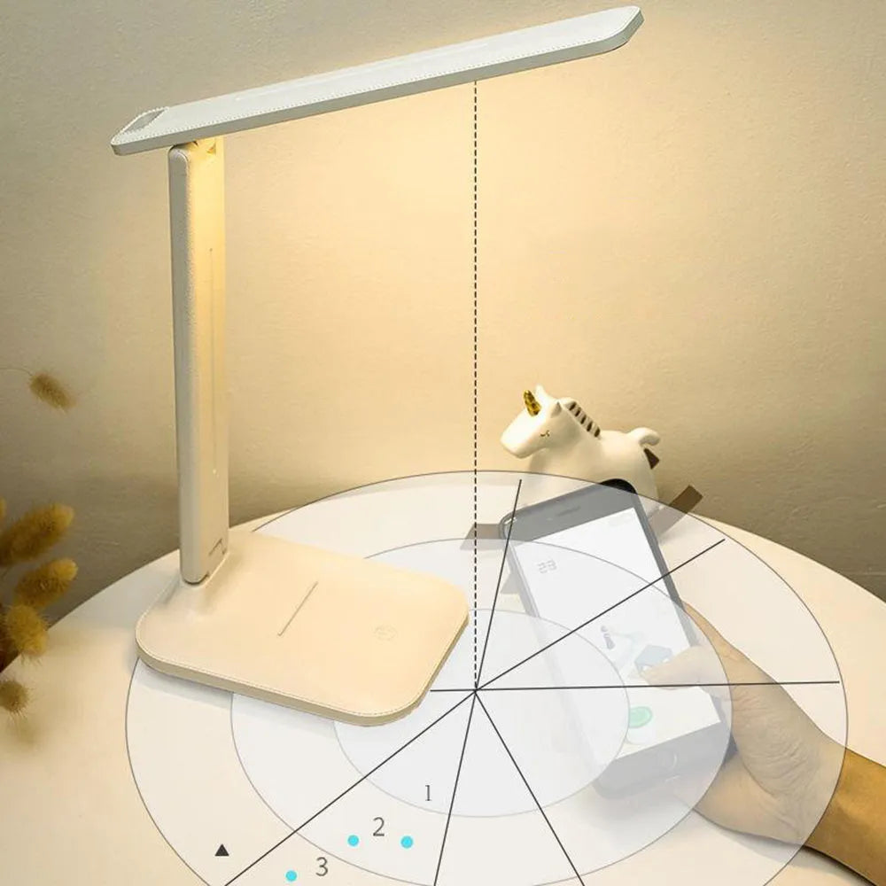 White plastic touch dimming bedside table lamp with USB charging port.