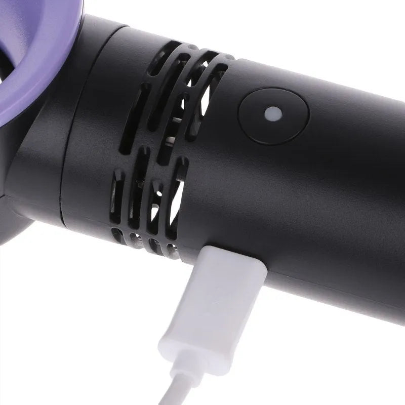 Compact portable bladeless fan on its base, shown in blue, with a USB cable for charging.