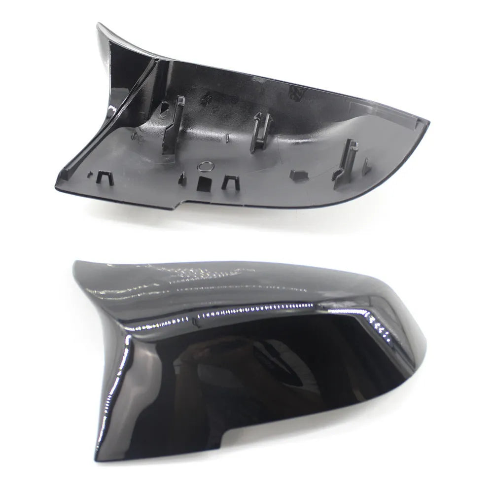 Pair of dark bright paint bright black modified horn rear-view mirror shells for BMW 3 Series and 4 Series.