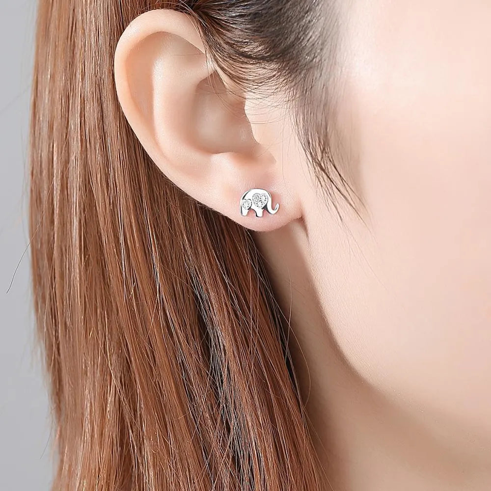 Small geometric Korean earrings for women in gold or silvery finish with gem setting detail