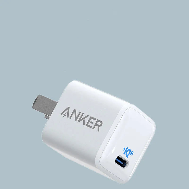 White 18W fast charging USB travel charger for mobile phones with compact design