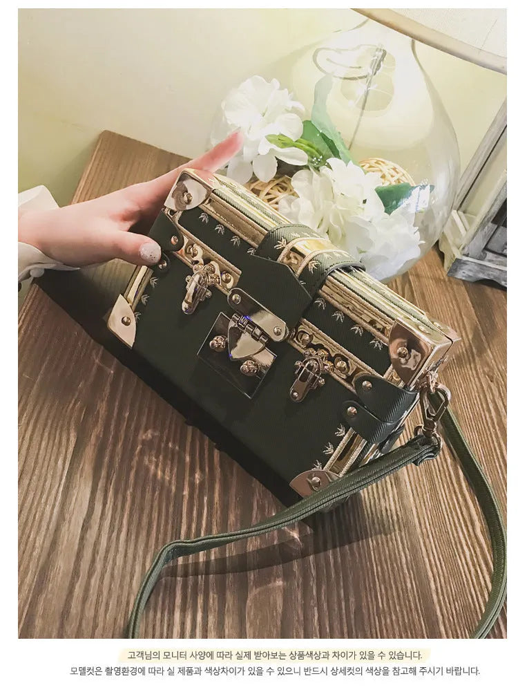 Women's hard PU shoulder bag with rivet decoration and hasp closure in black or green flap style