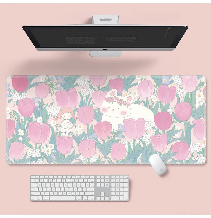 Floral pattern mouse pad on desk with keyboard, showing non-slip rubber base and colourful flower design