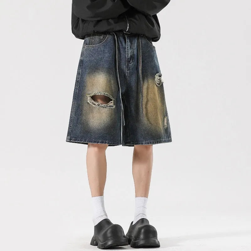 Retro blue loose fit distressed denim jeans with street style design
