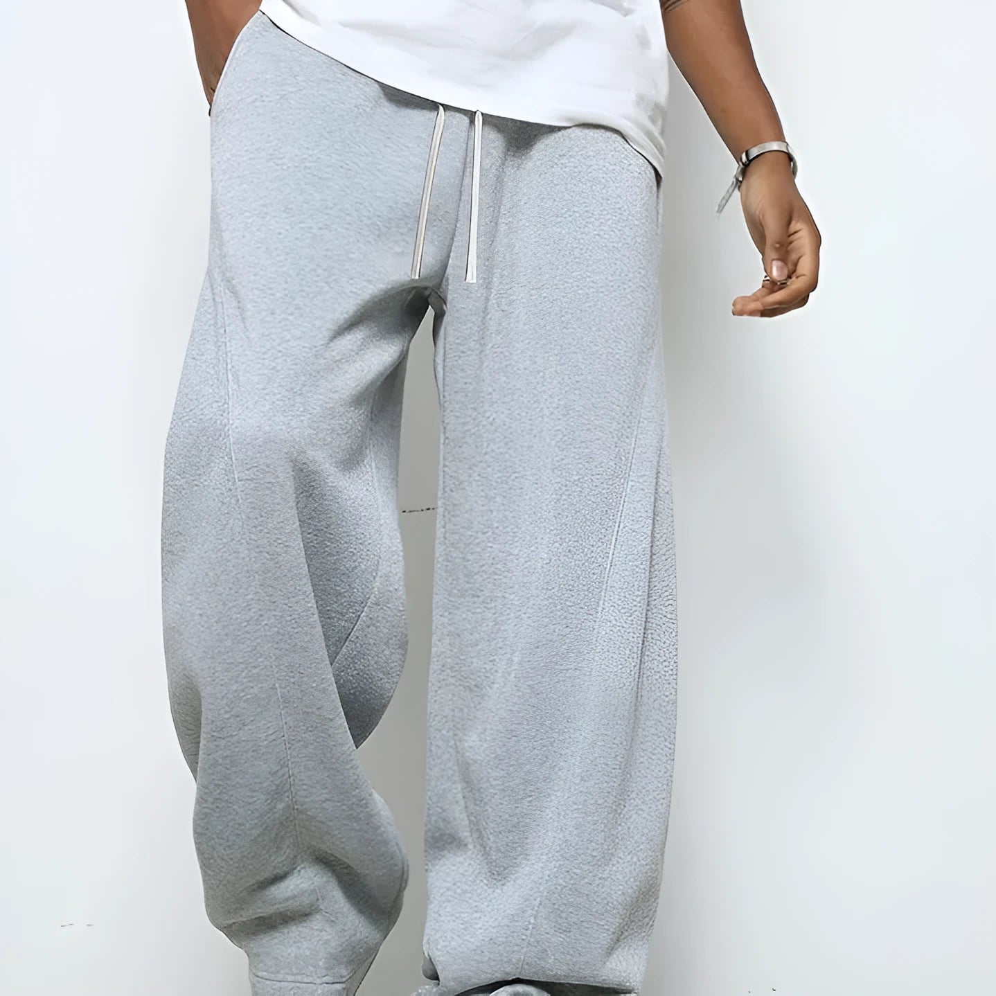 Men's straight-leg casual trousers in black polyester with a drawstring waistband.