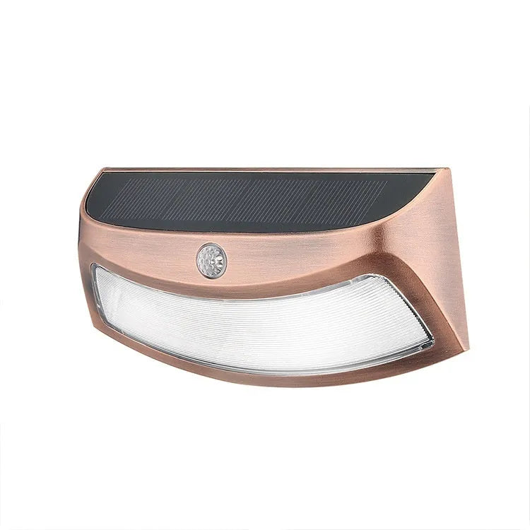 Solar outdoor wall lamp with smiling face design for garden courtyard lighting