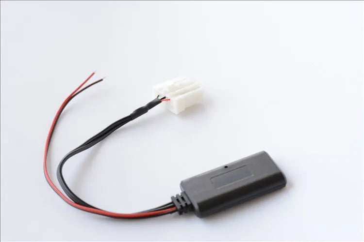 Black Bluetooth audio cable adapter for Mazda vehicles with Bluetooth 5.0 logo