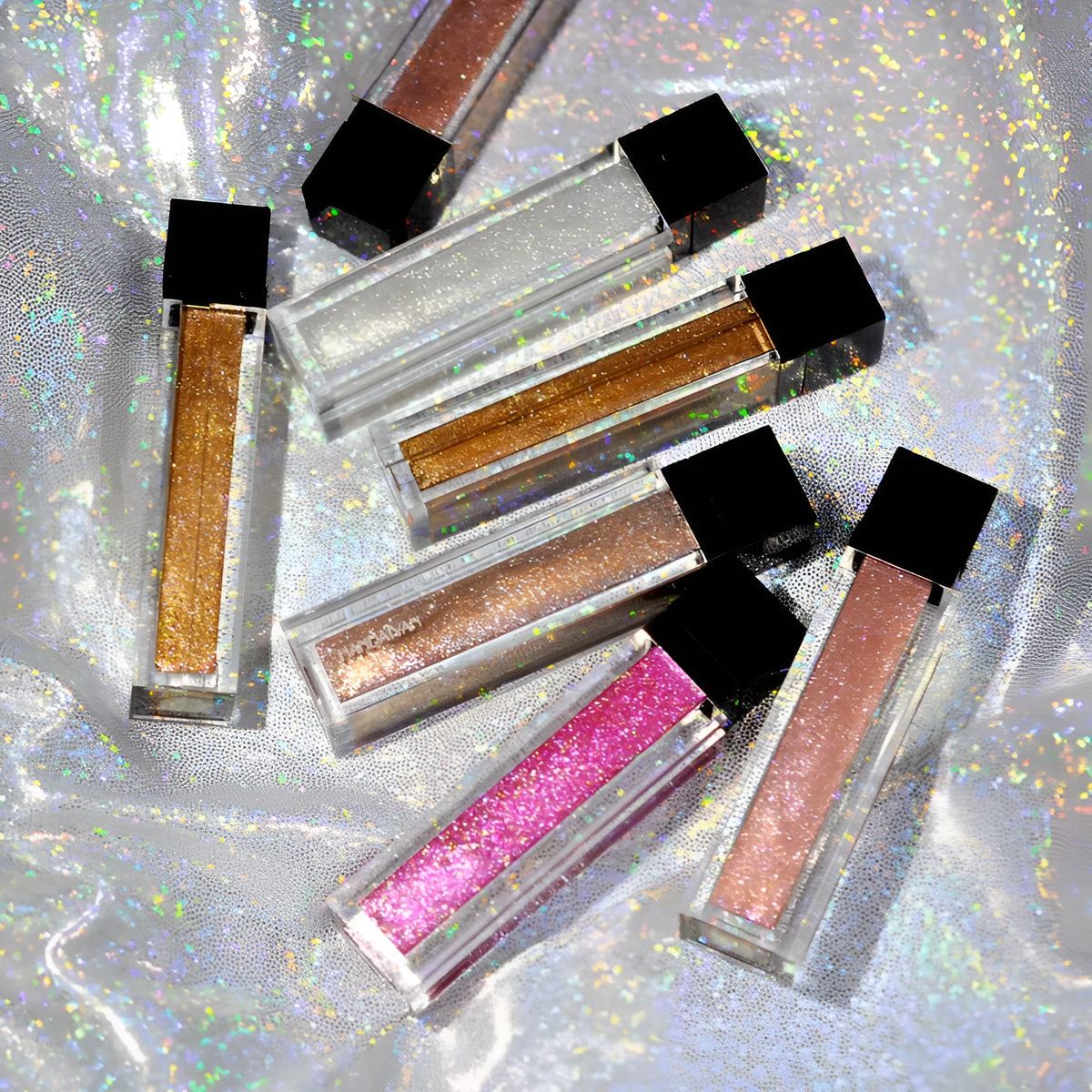 Shiny matte waterproof lip gloss tube with soft applicator, available in five shades including pink and rose red.