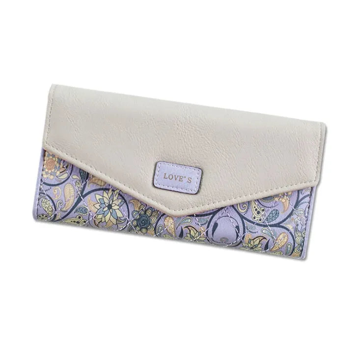 Three-fold women's leather wallet with buckle clip closure in five colour options showing dimensions