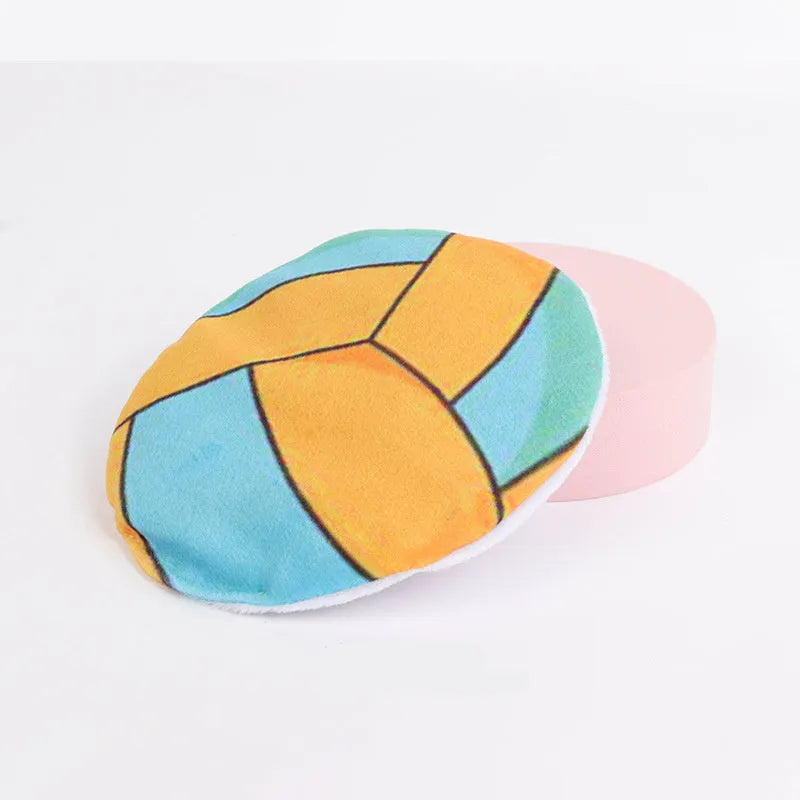 Soft plush cat flying disc toy with sports ball pattern, containing catnip and crinkle sound.