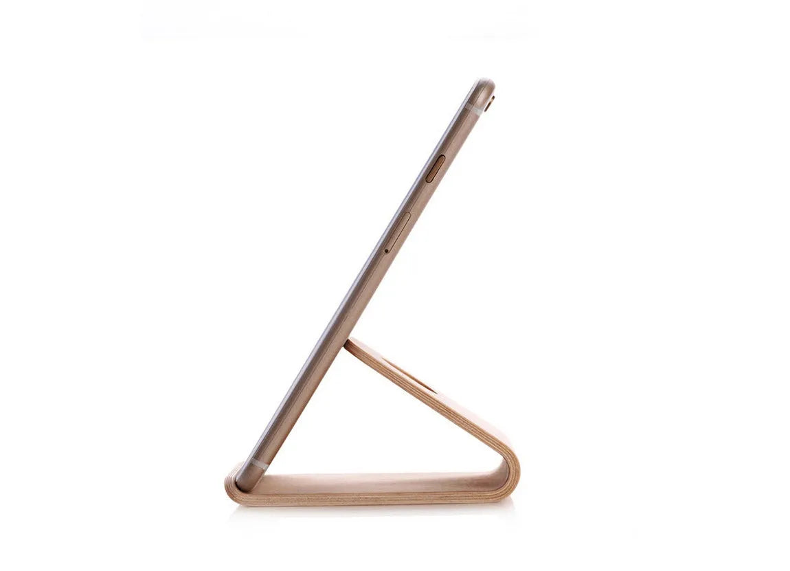 Wooden iPhone stand in walnut or maple finish showing angled bracket design