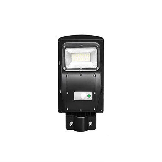 Integrated solar street light with solar panel and LED light in single housing unit for outdoor installation