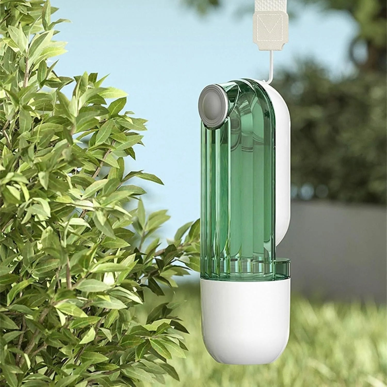 Beige or green folding portable dog water bottle with food dispenser, shown in open and closed positions.