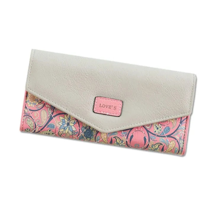 Three-fold women's leather wallet with buckle clip closure in five colour options showing dimensions