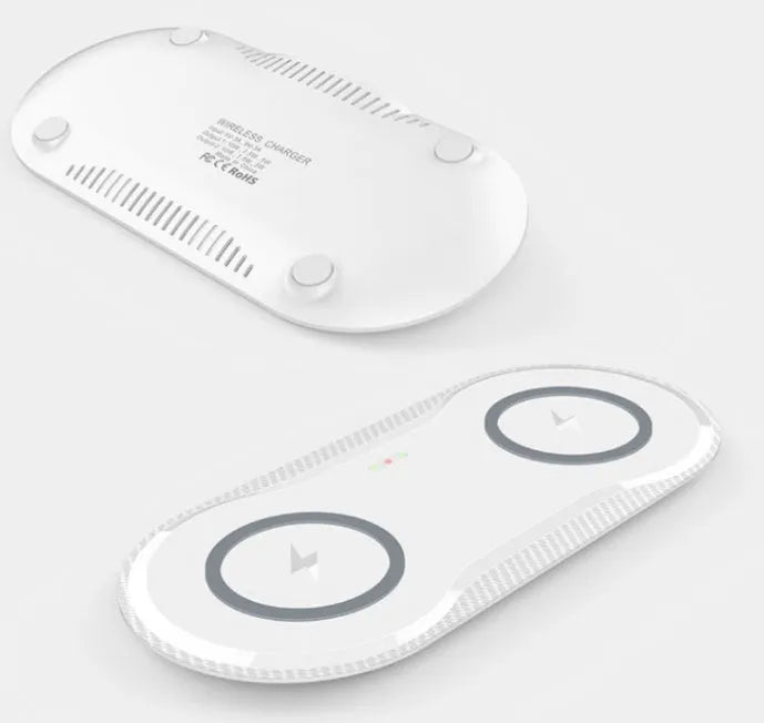 Black and white dual wireless charger charging Samsung and iPhone phones simultaneously