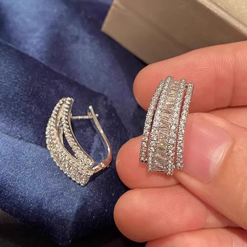 Women's geometric stud earrings with white gold colour finish and inlaid zircon stones