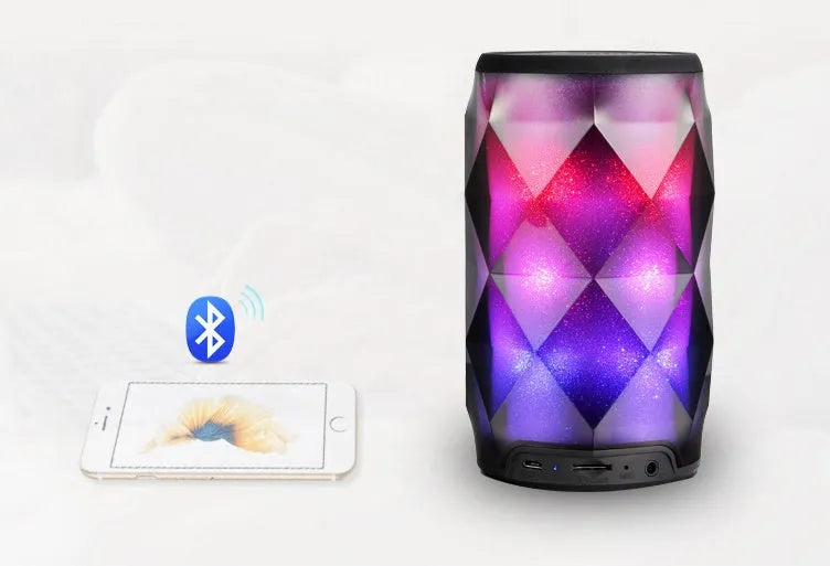 Black crystal Coca-Cola can lantern speaker with diamond-cut design and colourful starry sky lighting effect.