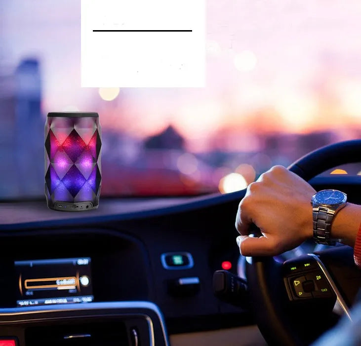 Black crystal Coca-Cola can lantern speaker with diamond-cut design and colourful starry sky lighting effect.
