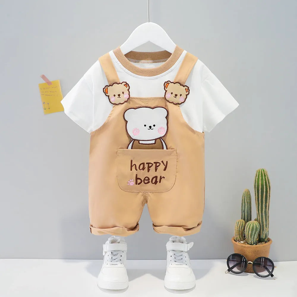 Yellow cotton baby overalls with cartoon prints and openable straps, shown in a Korean-style romper suit design.