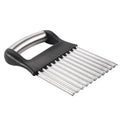 Stainless steel potato wave knife for cutting crinkle chips, shown on a kitchen surface.