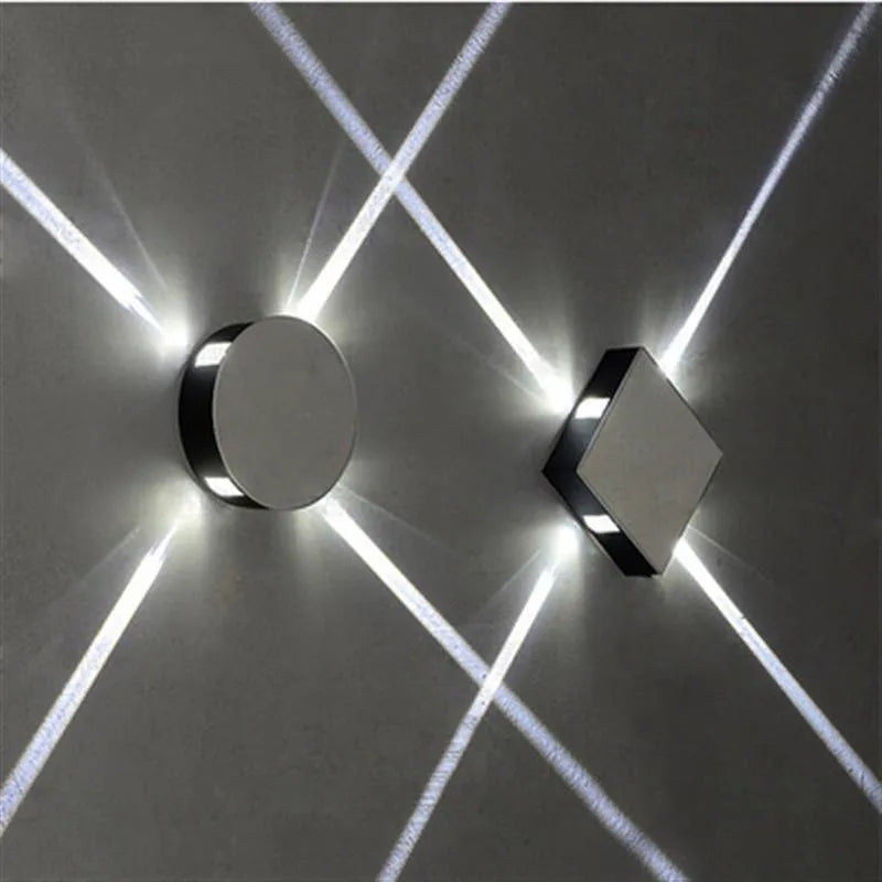 Modern square or round LED aluminium wall light with iron shade showing warm white illumination
