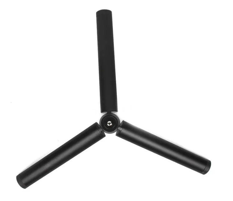 Black aluminium mobile phone tripod stabilizer with PTZ functionality on a table
