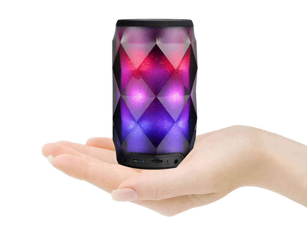Black crystal Coca-Cola can lantern speaker with diamond-cut design and colourful starry sky lighting effect.