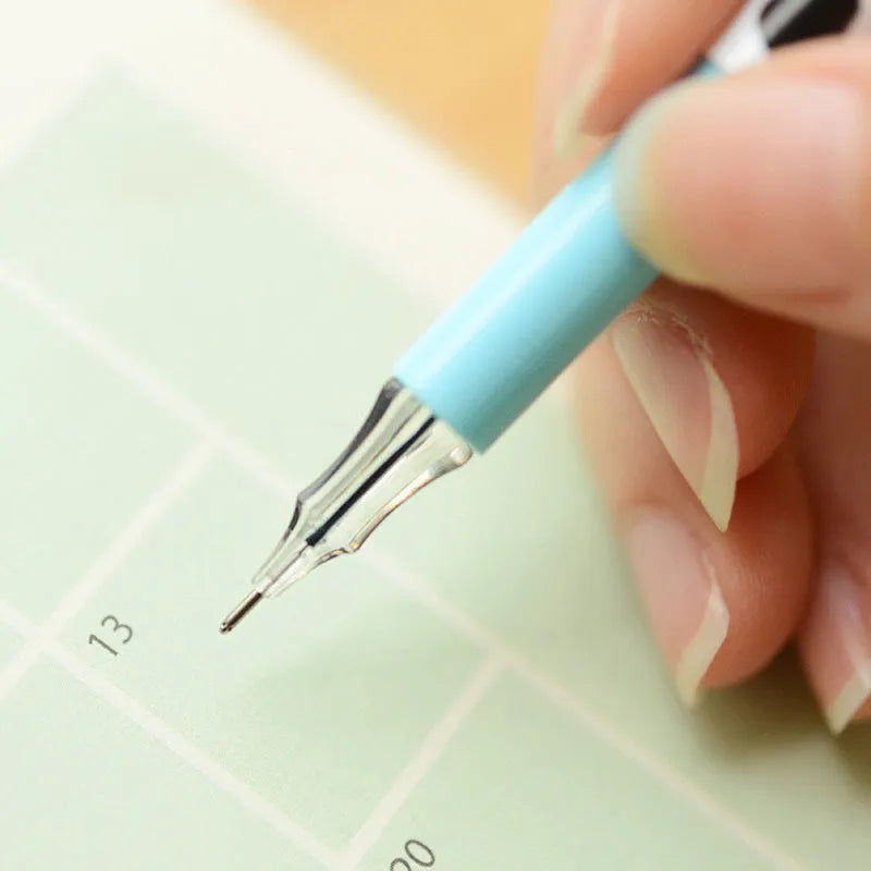 Box of twelve cow print patterned gel pens with 0.38mm fine tips in assorted colours.
