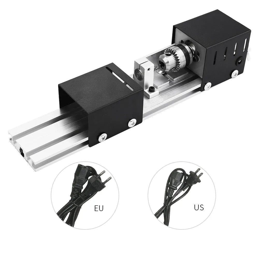 Silver metal mini manual woodworking lathe with carving knives on a workbench