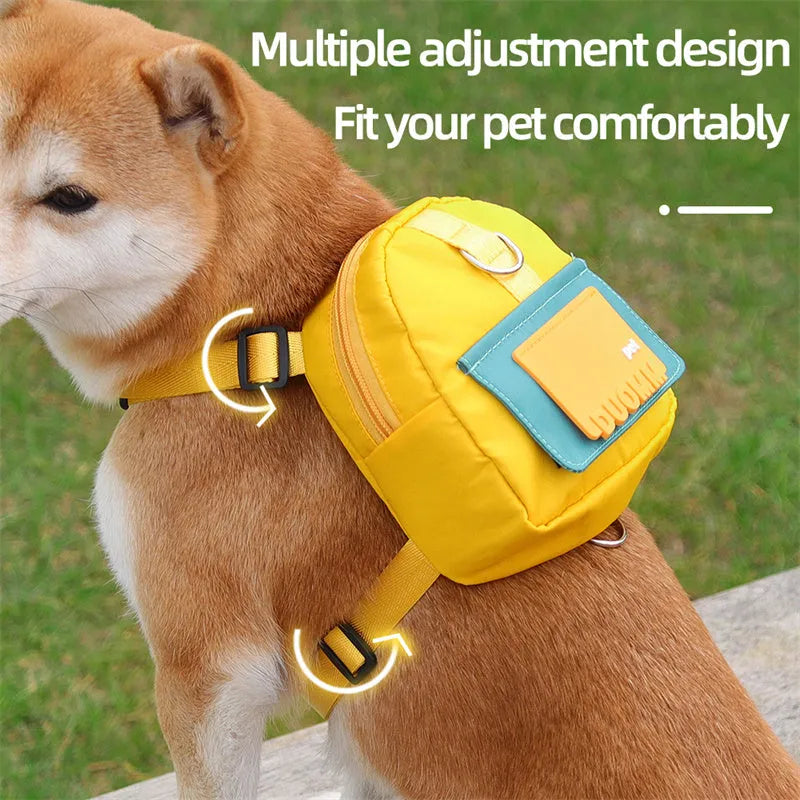 Blue adjustable dog backpack with harness and storage compartments for travel