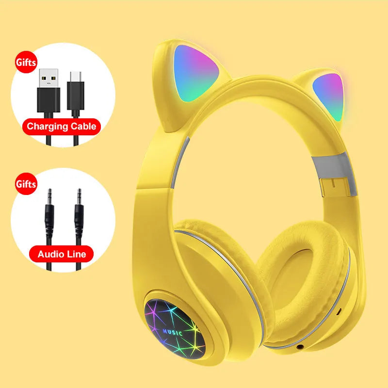 Colourful cat ear style wireless Bluetooth sports headset with a headband, shown in pink.