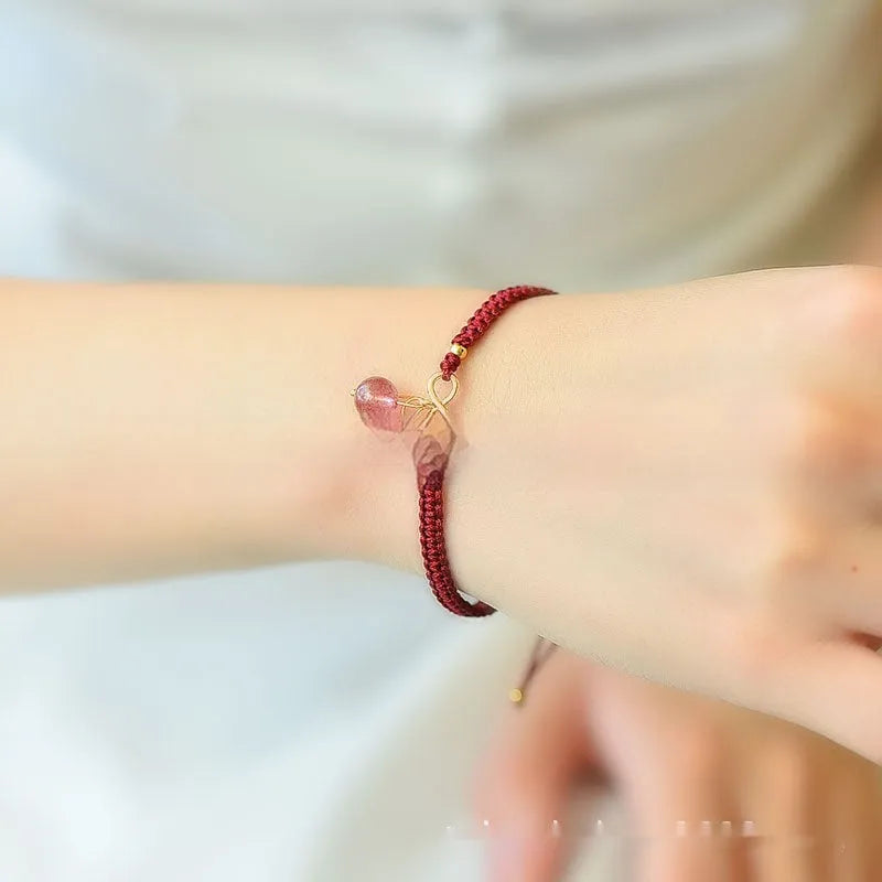 Women's natural crystal bracelet with fruit-shaped beads in strawberry quartz, amethyst, or green phantom quartz.