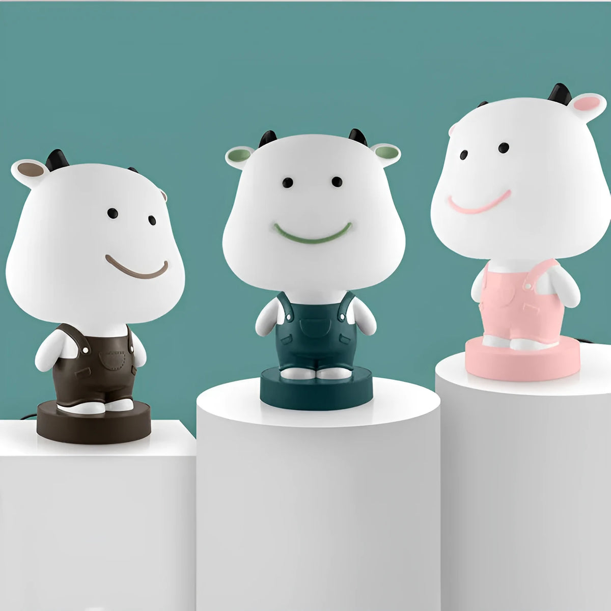Animal table lamp with cartoon design showing bear, cattle, rabbit or tiger variations with LED light source