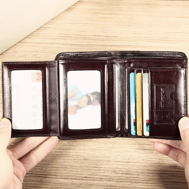 Men's leather wallet open showing photo holder, card slots, banknote folder, and hidden zippered compartment.