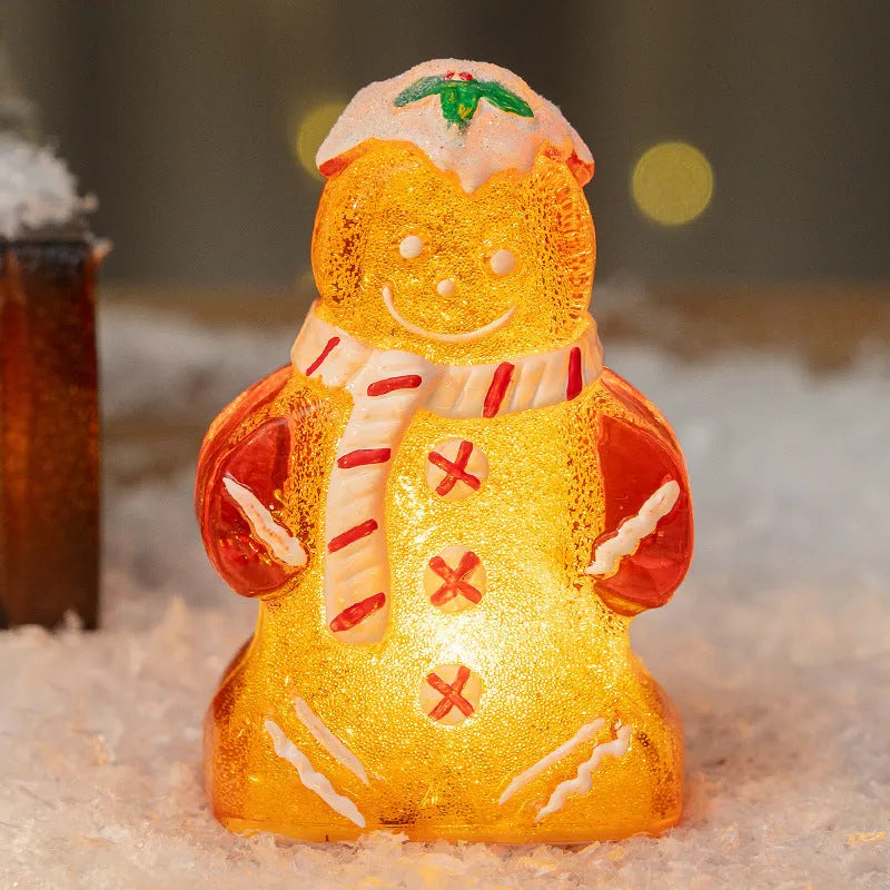Glowing gingerbread man snowman Christmas ornament with LED lights in plastic construction