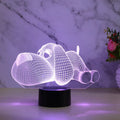 Doggo desktop lamp showing 3D illusion dog design with multicolour LED lighting