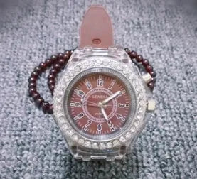 Women's LED luminous watch with colourful dial on silicone strap showing 43mm size