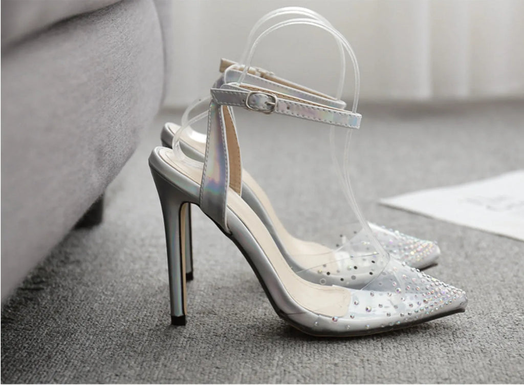 Women's pointed toe stiletto heel sandals with a PVC upper, shown on a size chart.