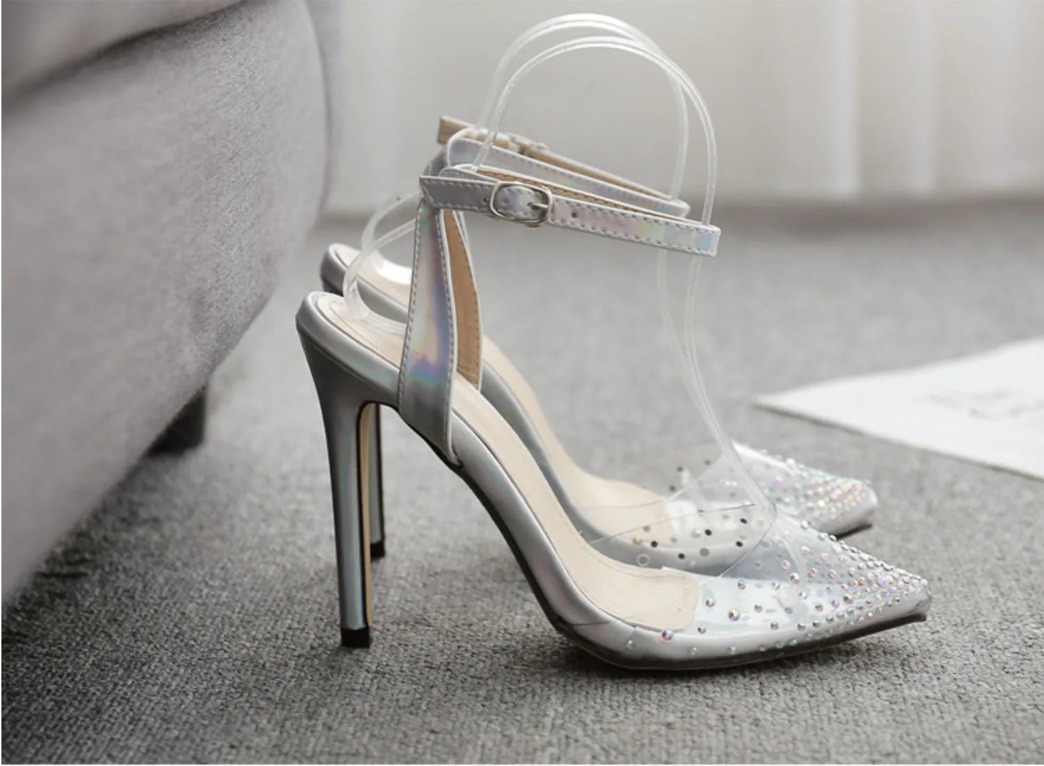 Women's pointed toe stiletto heel sandals with a PVC upper, shown on a size chart.