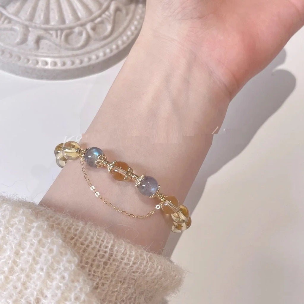 Chinese style women's crystal bracelet with electroplated 14K gilded finish and diamond-shaped moonstone golden sun stone elements