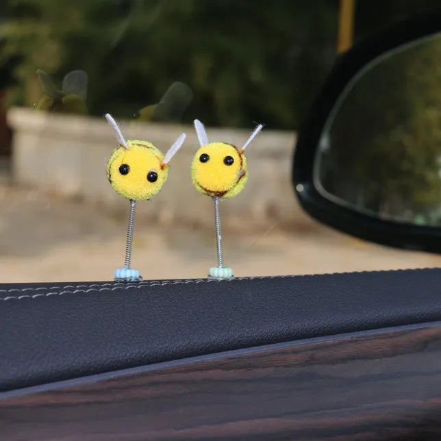Swing Spring Bee car decoration showing a small, soft fur ball bee on a 3cm by 3cm scale.