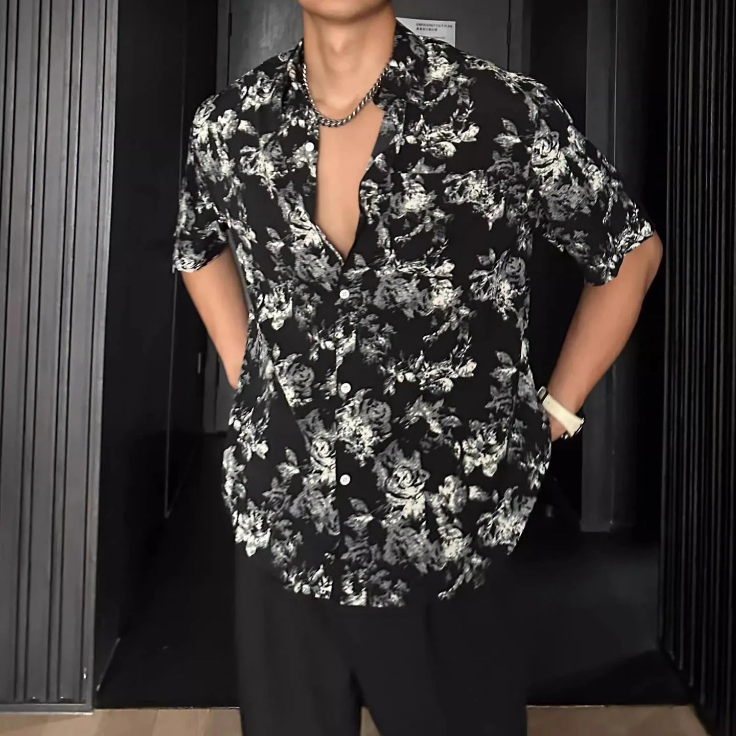 White floral printed casual shirt with short sleeves and loose cardigan-style fit