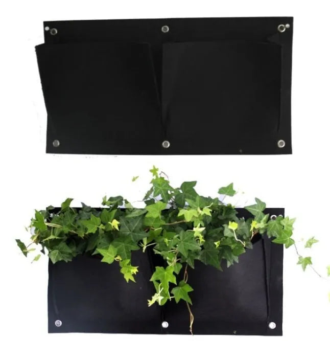 7-pocket vertical felt planter bag hanging on a wall with green plants growing in each pocket