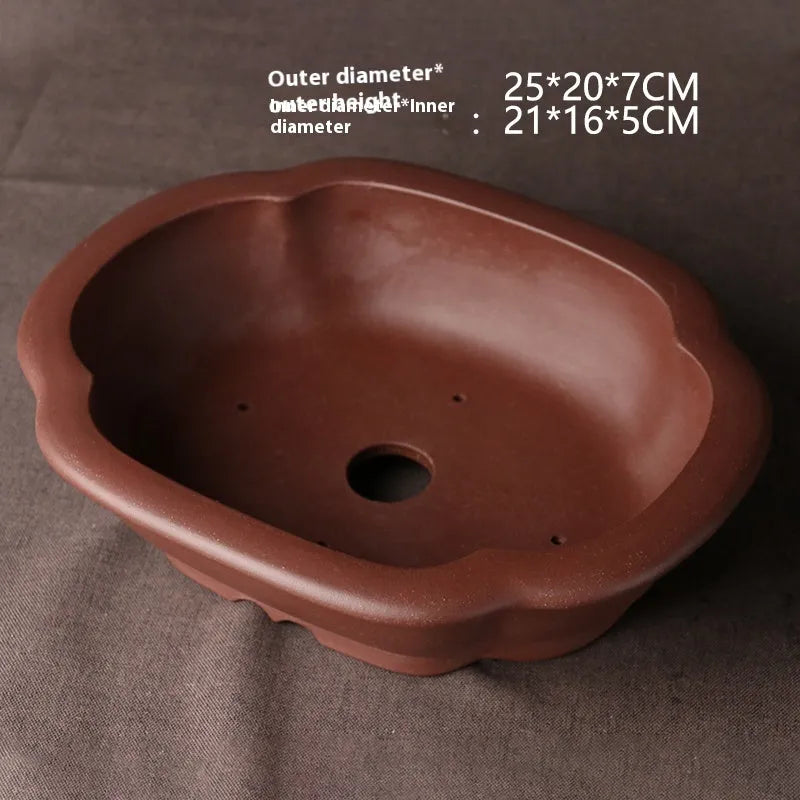 Handmade purple clay Chinese style bonsai basin measuring 25cm by 20cm by 7cm
