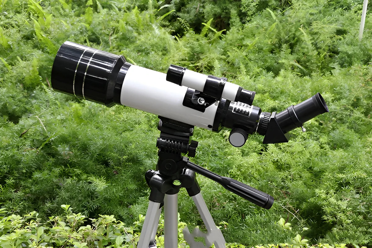 Children's dark blue astronomical telescope with monocular design on tripod for stargazing