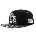 Adjustable cotton baseball hat with embroidered letters in black or white colour