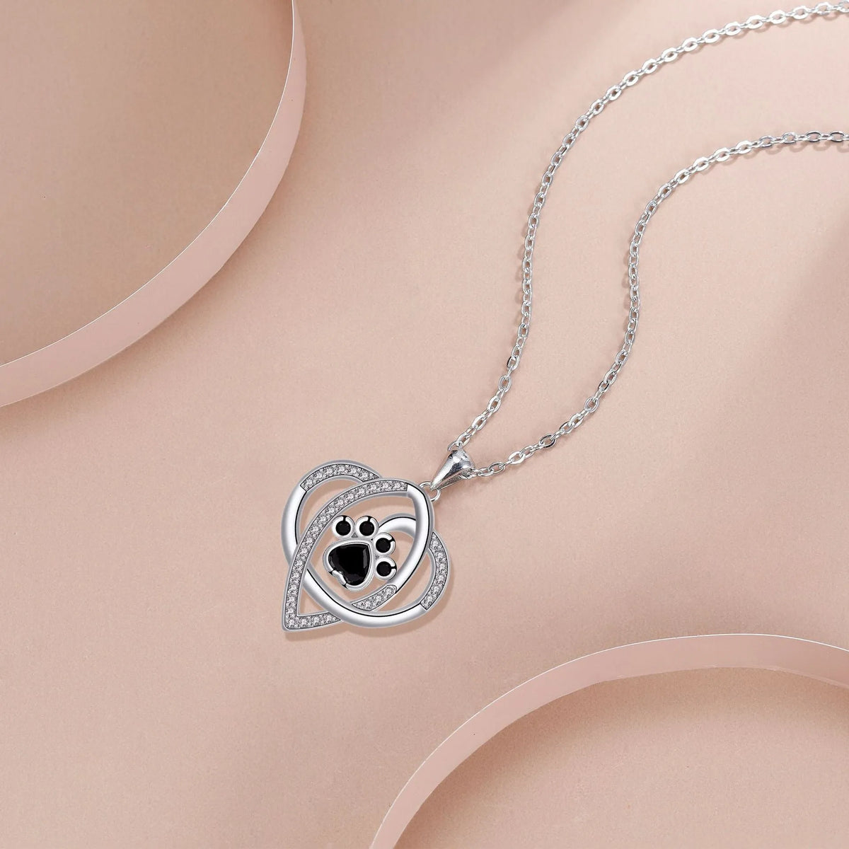 Women's necklace with dogs and cats paw prints pendant on cross chain