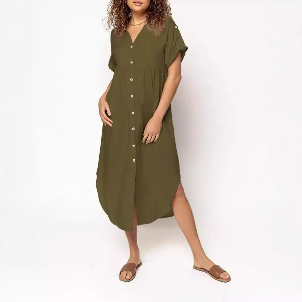 A loose-fitting, solid-colour mid-length casual dress with a front button closure and regular sleeves.