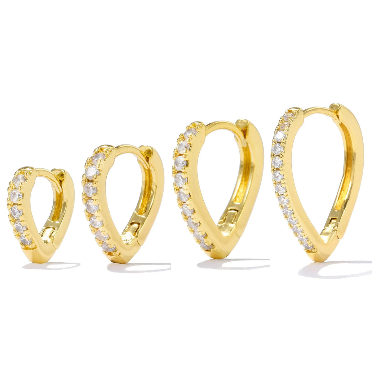 Copper ear clip with geometrical heart design in gold or white electroplated finish